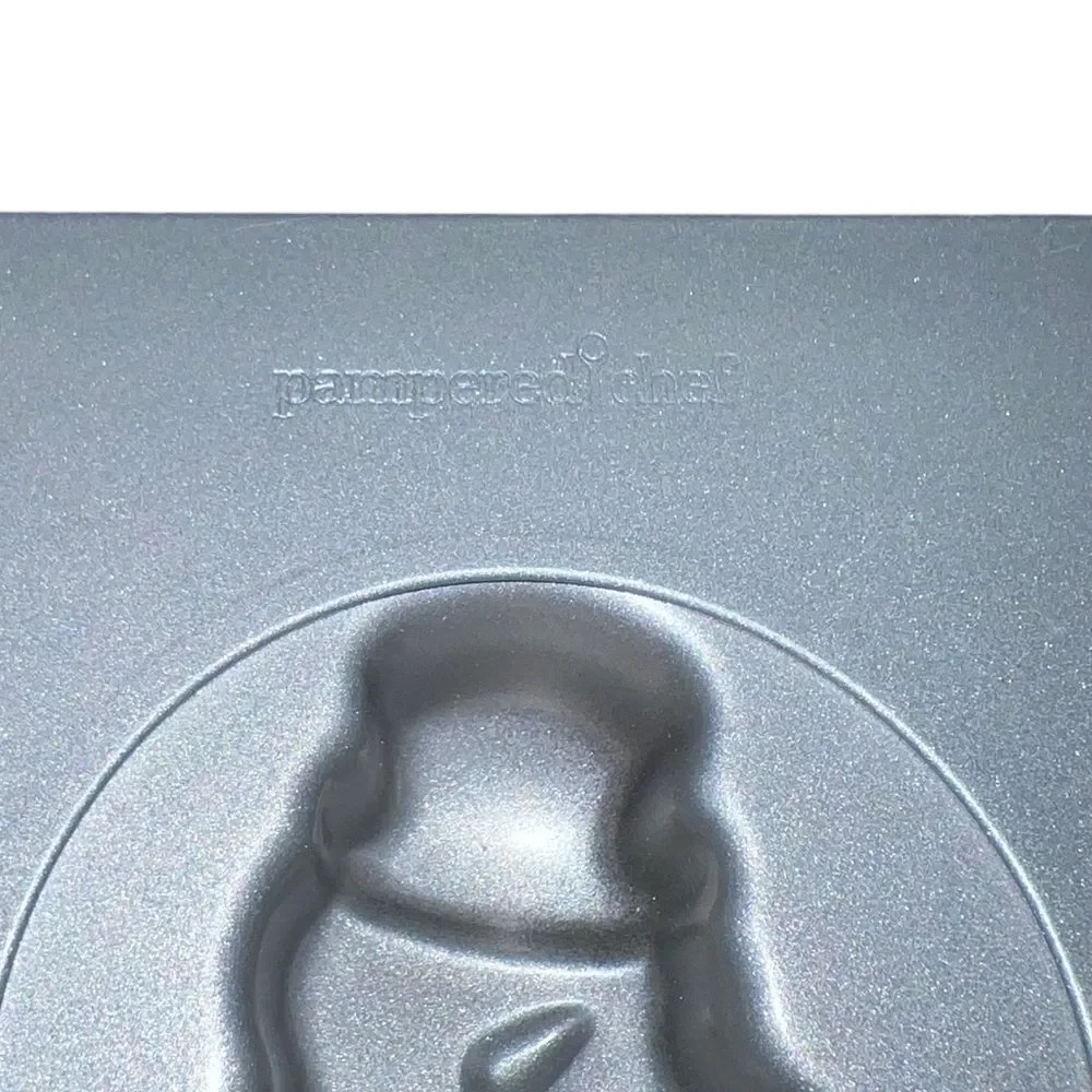 The Pampered Chef Christmas baking‎ pan with twelve molds and 2 shapes